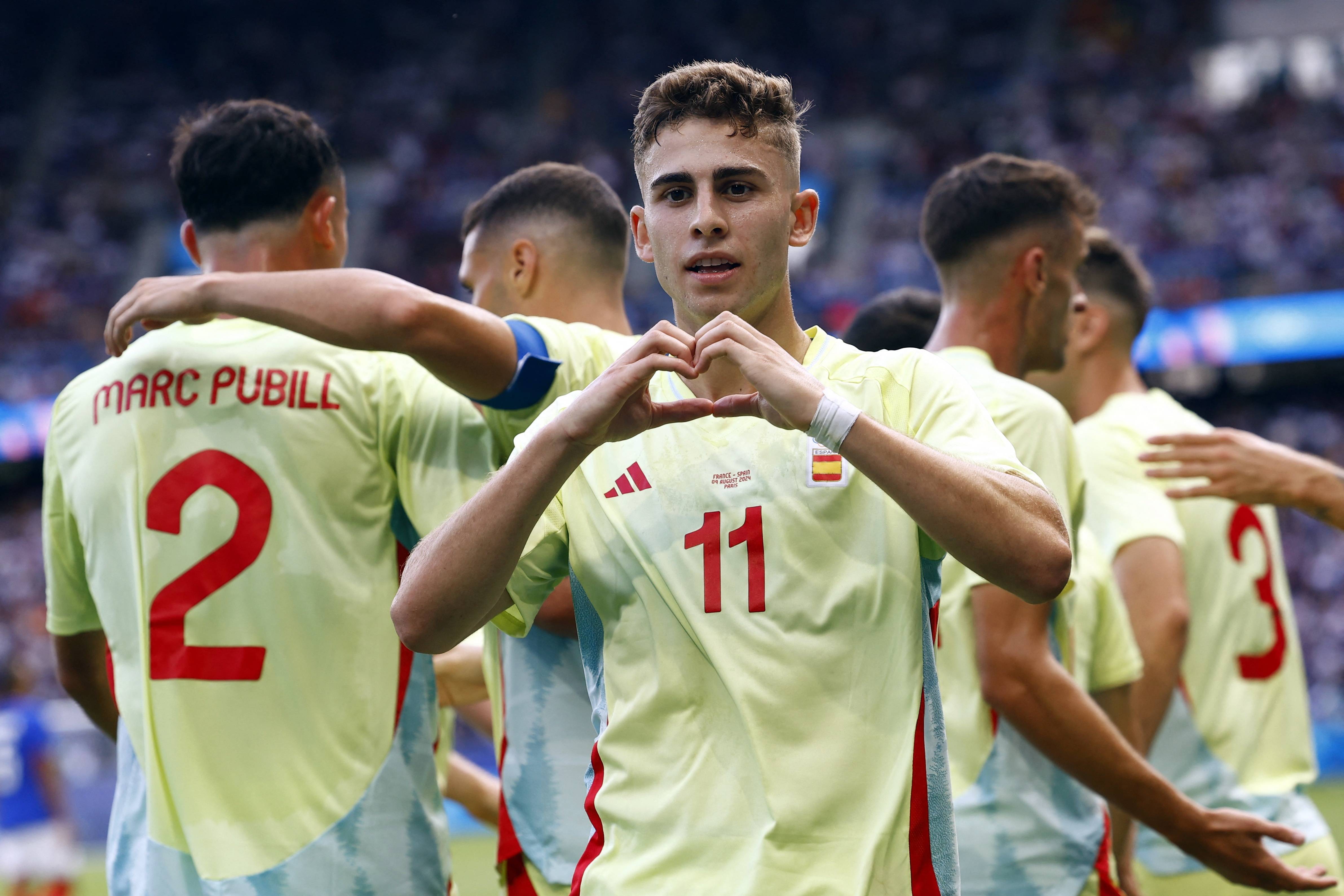 西班牙队团结合作,困难胜利获奖金牌的简单介绍 西班牙队团结合作,困难胜利获奖金牌的简单介绍